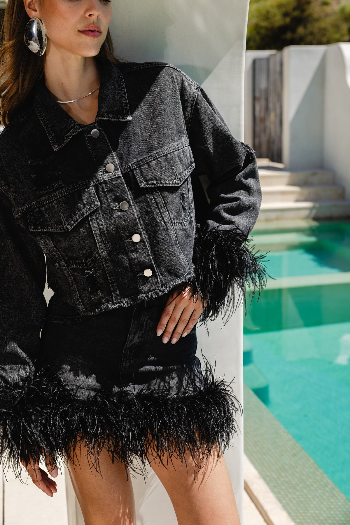 The Frequencies Distressed Denim Feather Trim Jacket in Black