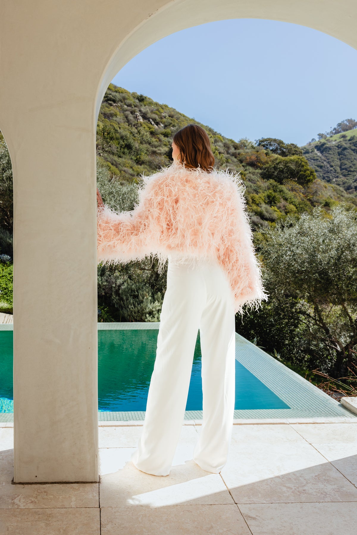 The Entitled Feather Jacket in Baby Pink