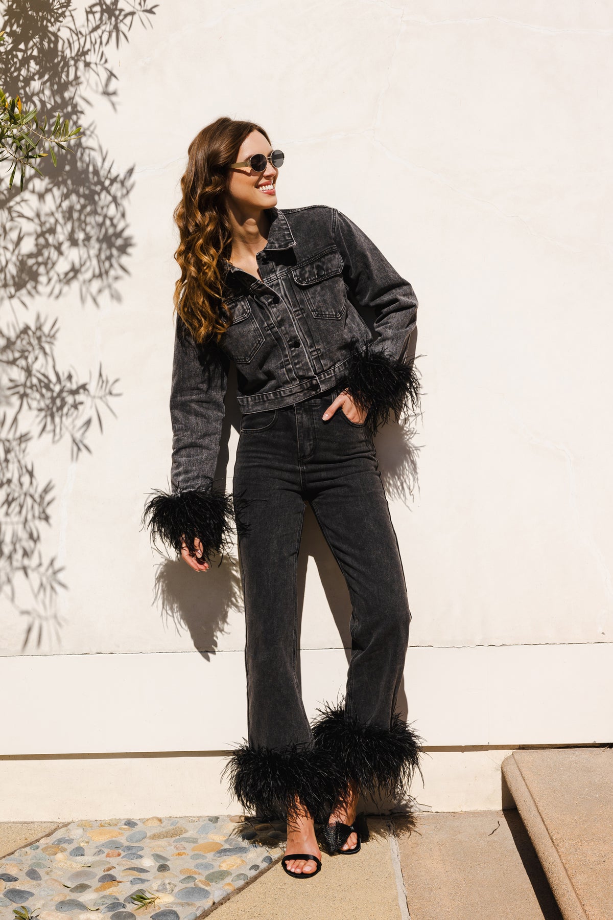 The Raya Denim Cropped Feather Trim Jacket in Black