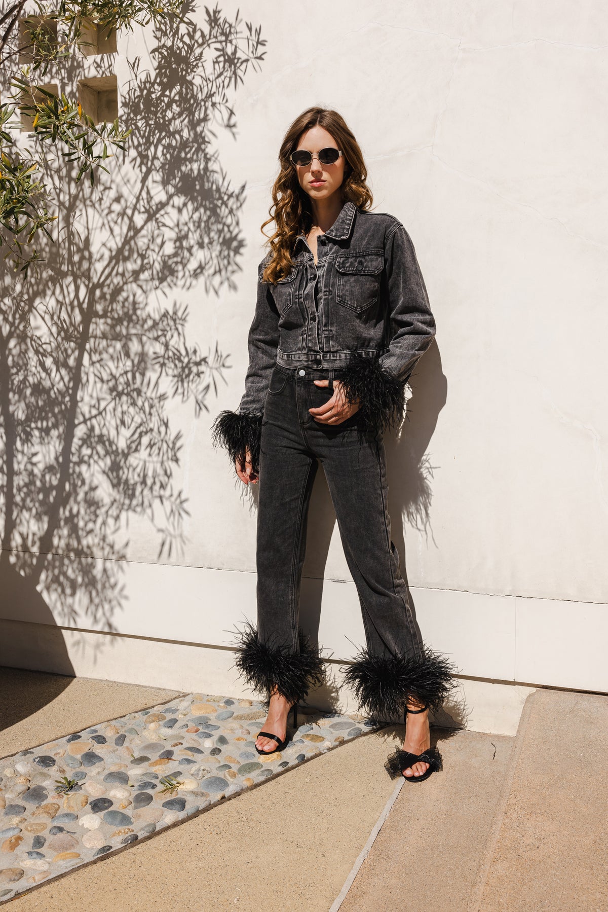 The Raya Denim Cropped Feather Trim Jacket in Black