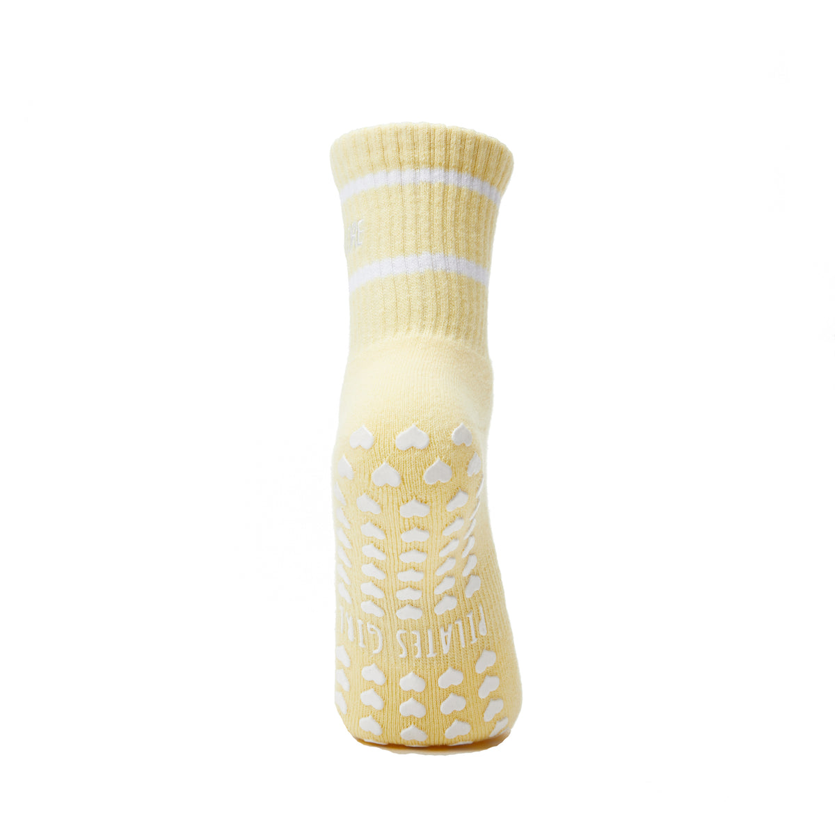 Serving Core Pilates Grip Crew Socks in Pale Yellow